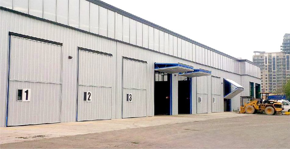 All eight Schweiss bifold doors installed on Cubex Limited building shown in varying positions