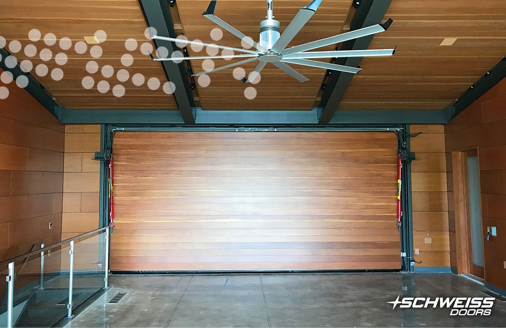 Schweiss Garage Door in Texas has class with its wood cladding