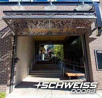 Schweiss bifold doors/gate opened to apartment atrium