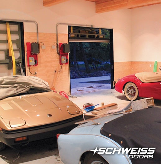 Schweiss Bifold Doors have addons to protect Struther's collection of classic British cars
