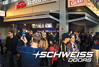 Schweiss Bifold Concession stand Doors are flooded with customers