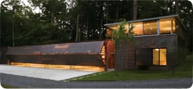 New York lake home with 4 bifold garage doors