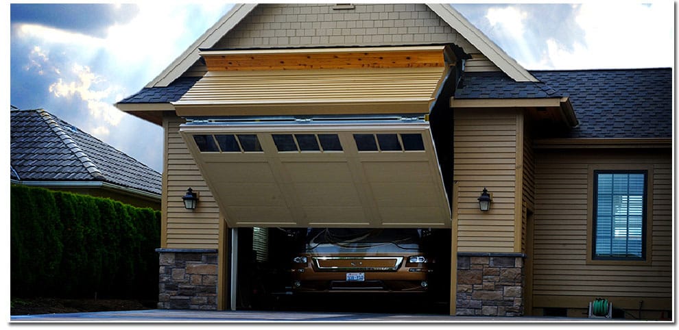Two patented Schweiss liftstraps and a heavy-duty bottom-drive motor easily lift the 16 ft. RV Schweiss bifold garage door.