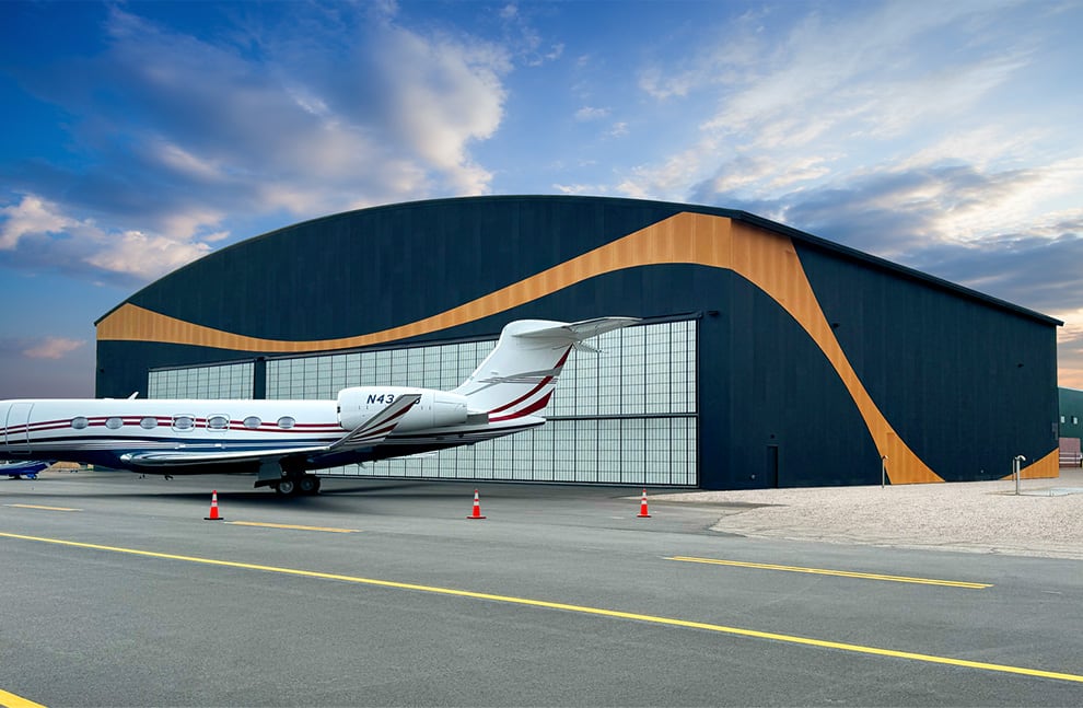 Exterior view of hangar fitted with 120ft Schweiss Stand-Alone Hydraulic Door